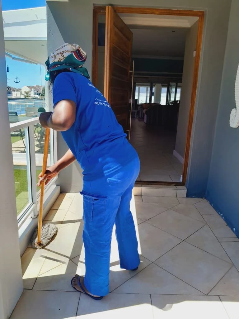 Professional window and glass cleaning at a Cape Town apartment with balcony access